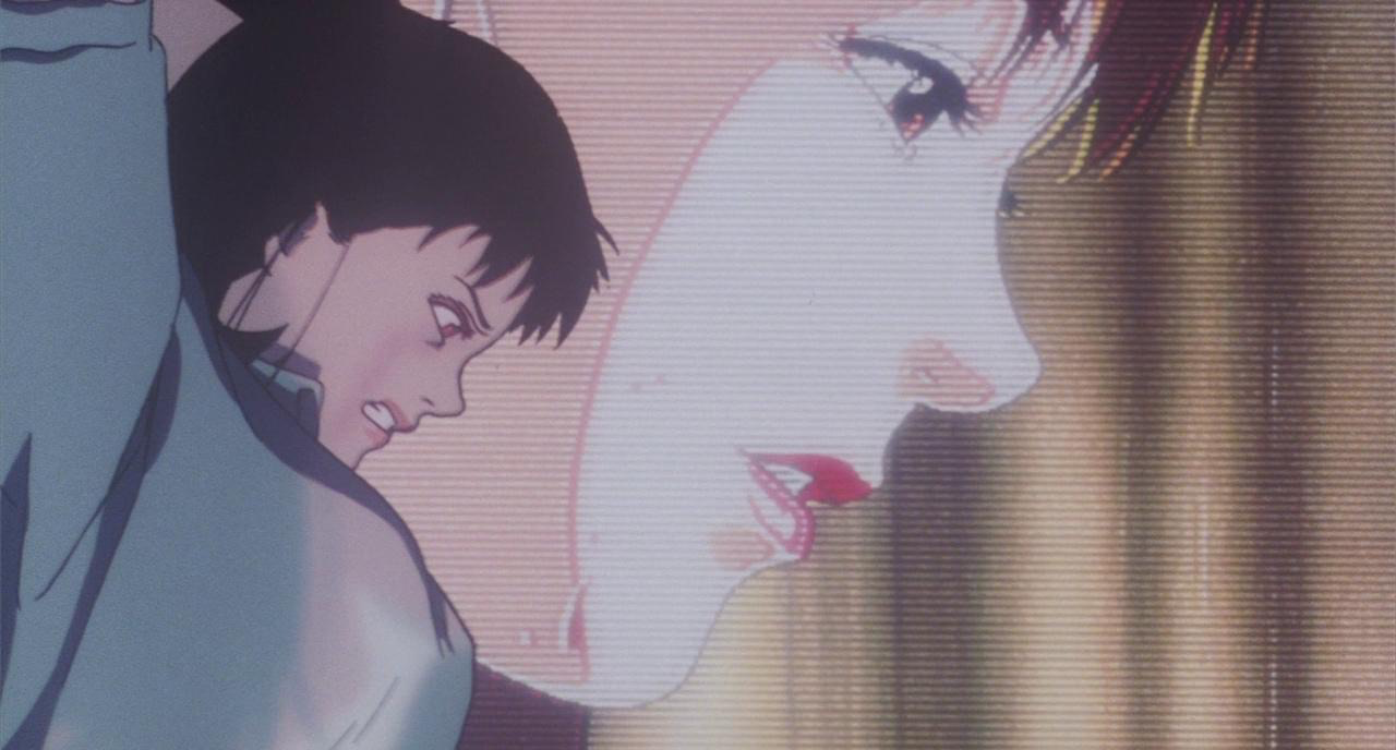 Mima angrily looking down with an image of herself in the background
